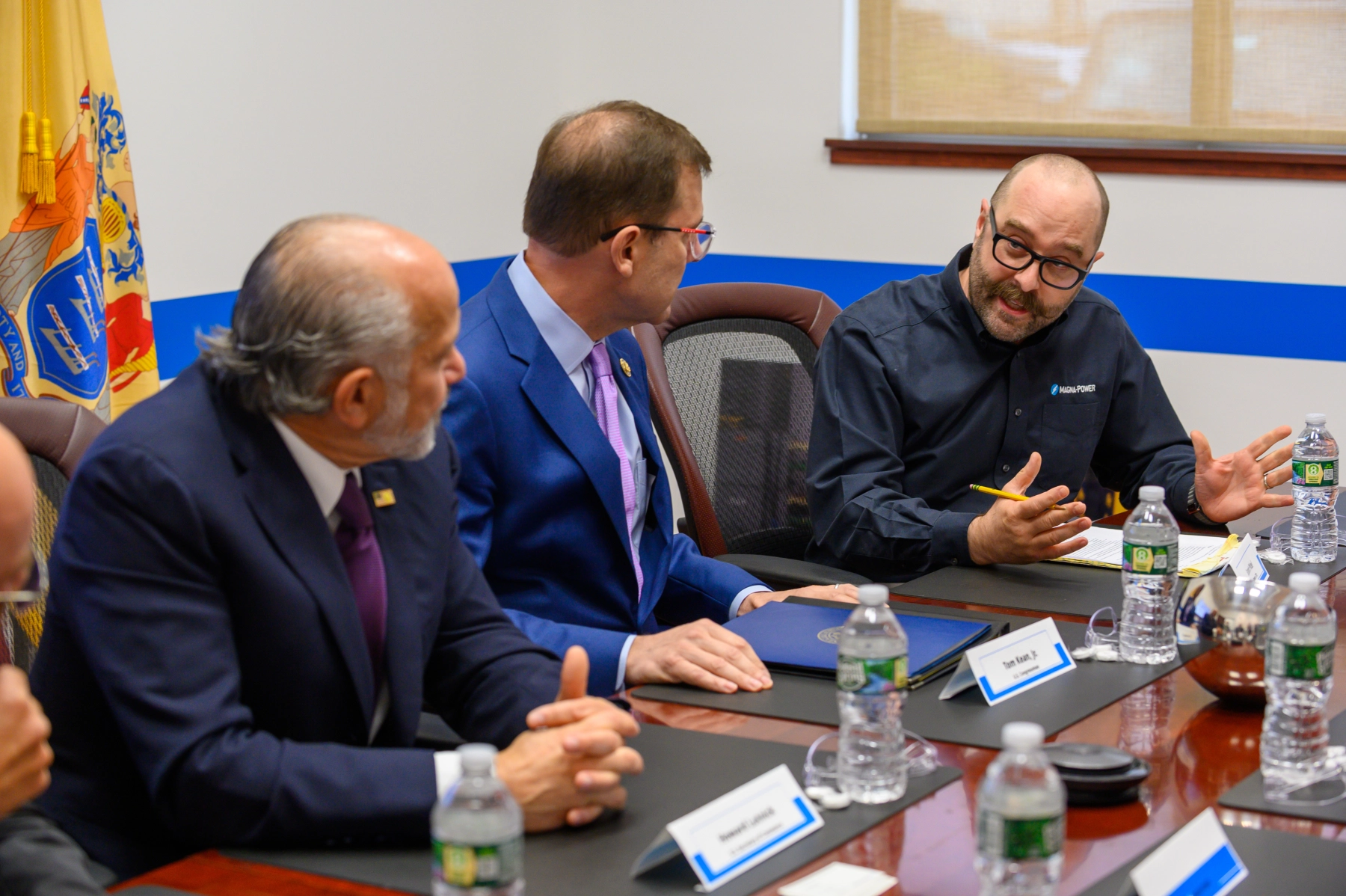 Round table discussion at Magna-Power Electronics of recent policies and how they've impacted Magna-Power's manufacturing and R&D operations. From left to right: United States Secretary of Commerce Howard Lutnick, Congressman Tom Kean, Jr., Magna-Power Electronics CTO Grant Pitel, Ph.D.