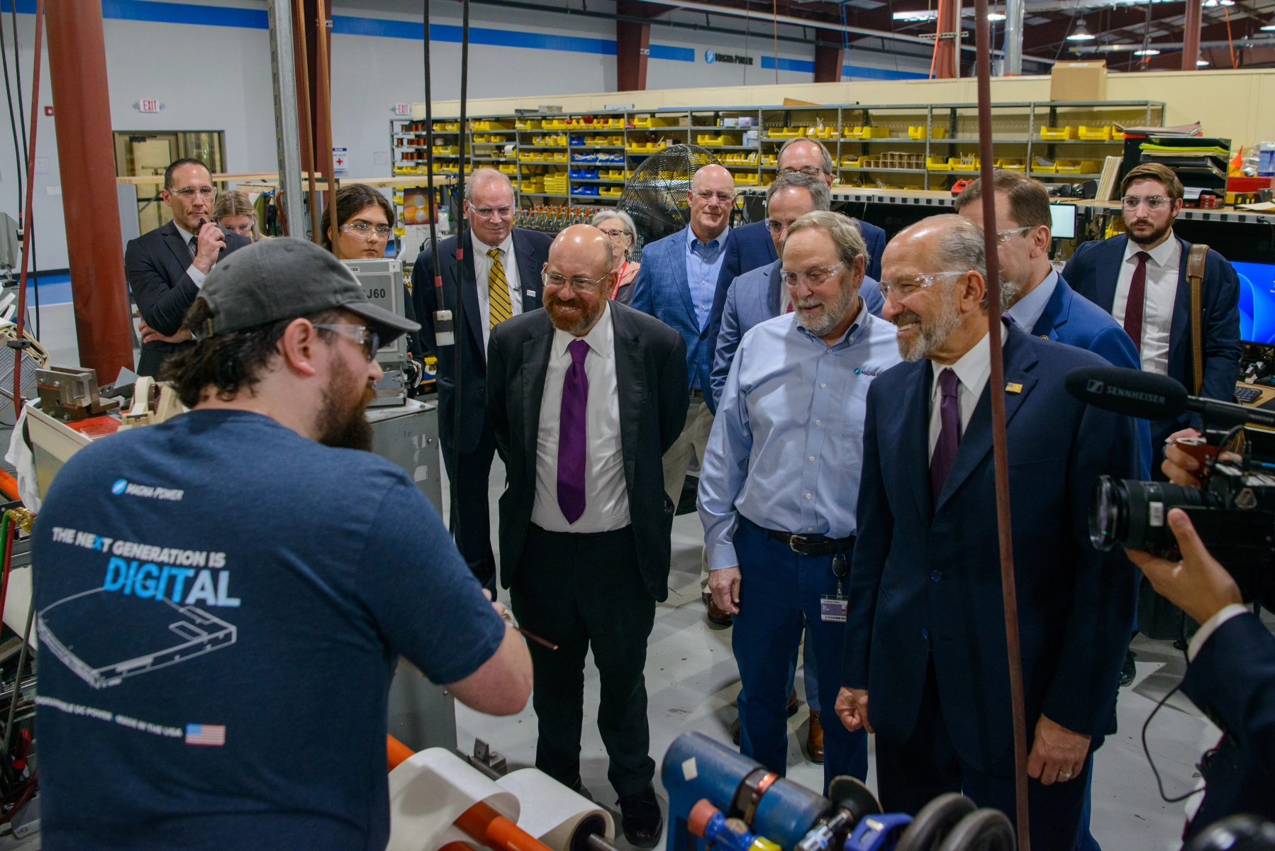 Magna-Power's Brendan Seigel demonstrates how a transformer is wound-to-order based on the model ordered by a customer; a process kept internal to Magna-Power to maintain competitive edge in product offering, intellectual property, and build-time, despite availability of lower cost overseas labor centers offering similar assemblies.