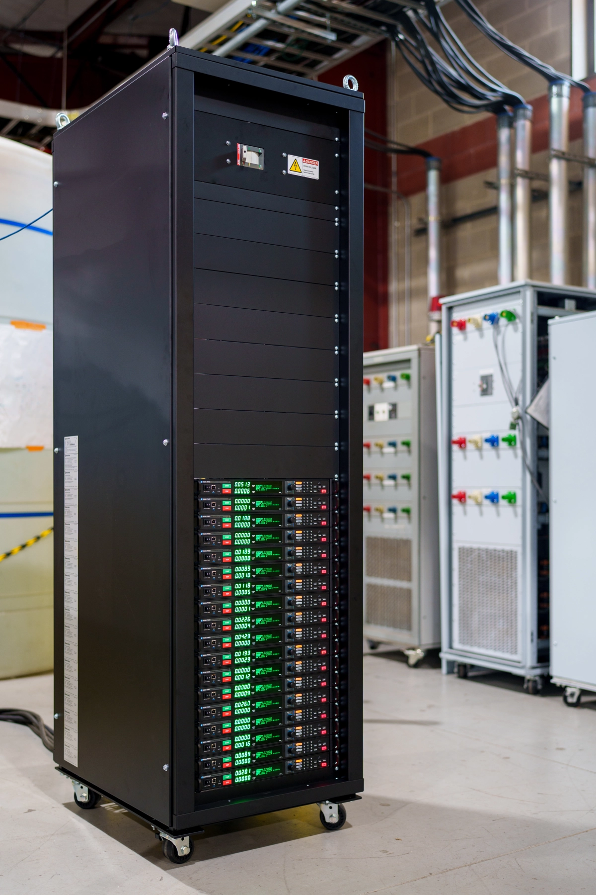 SLx Series power supplies with the +C1 option, which adds a textured black powder coat and a black front panel.