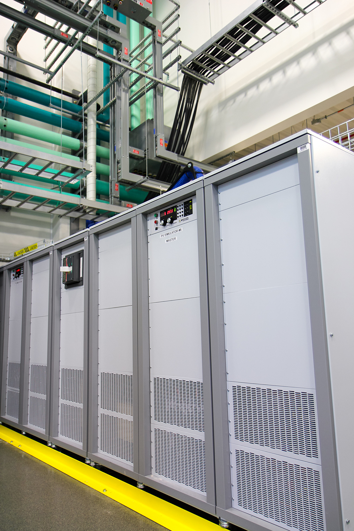 Figure 3. Multiple Magna-Power 250 kW MT Series power supplies at NREL used for solar array emulation.