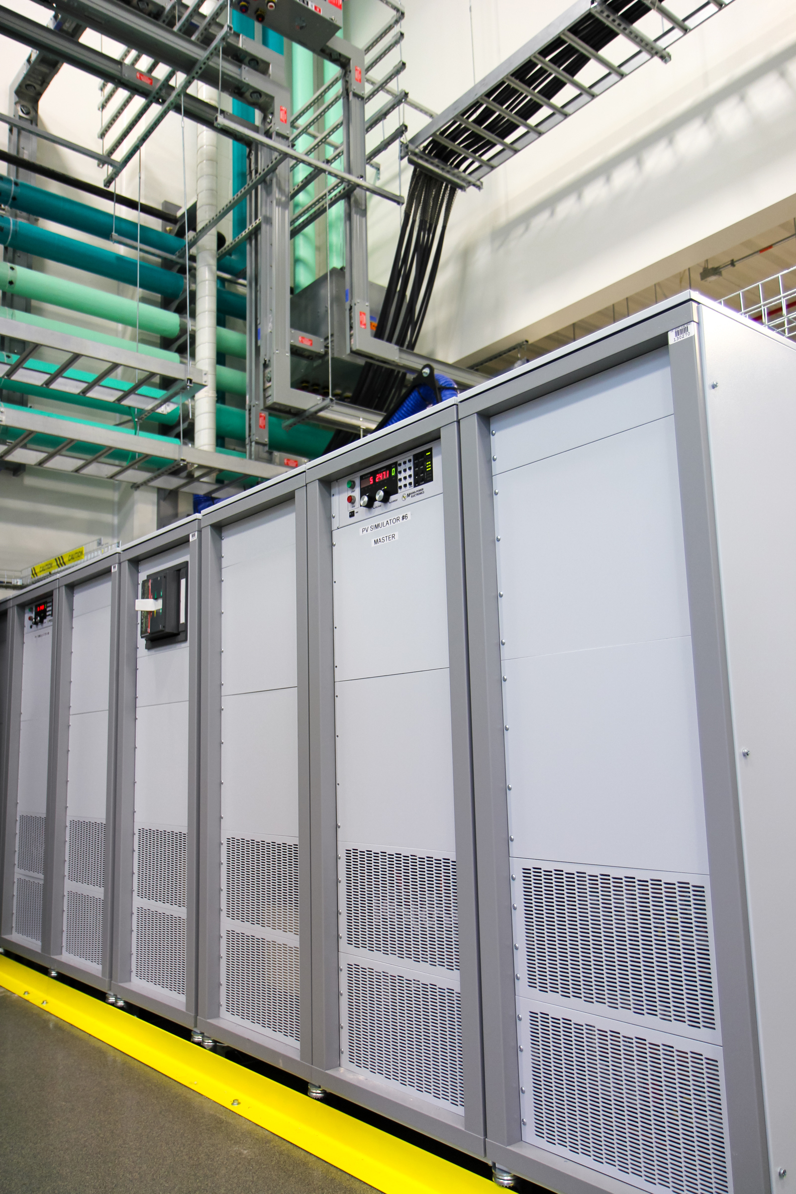 Figure 3. Multiple Magna-Power 250 kW MT Series power supplies at NREL used for solar array emulation.