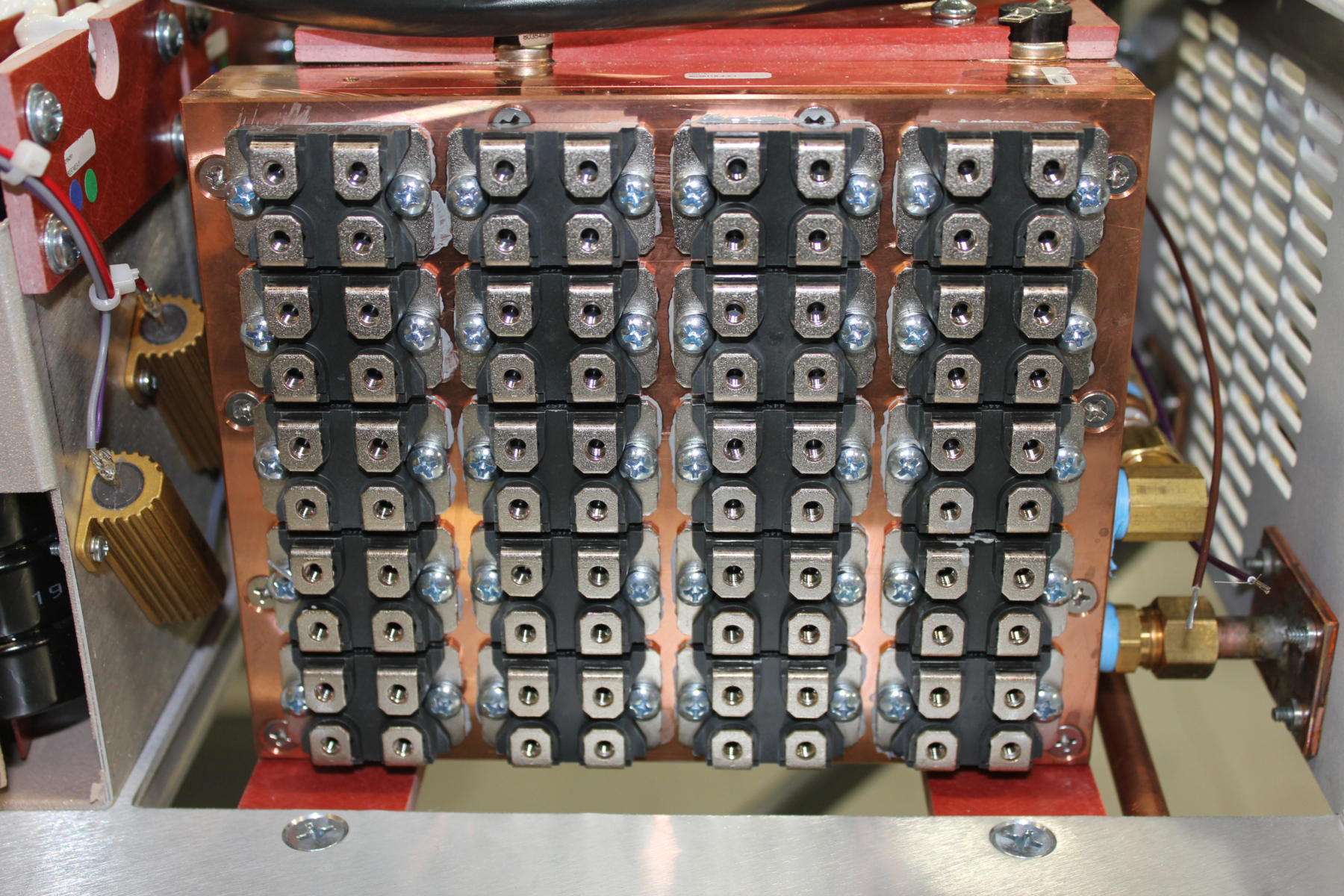 Fig 4. SOT-227B rectifying diodes attached to a water-cooled heatsink in a 25 kW power supply.