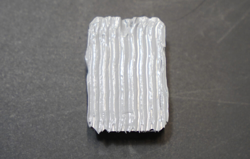 Fig 10. Spatula spreading of Pitel Paste AZ-01 thermal paste using 3D printed spatula.
